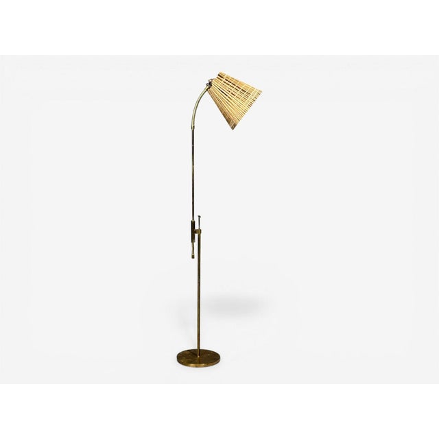 Falkenbergs Belysning, Swedish Mid-Century Modern, Adjustable Floor Lamp, Brass, Bamboo, Sweden, 1960s An adjustable...