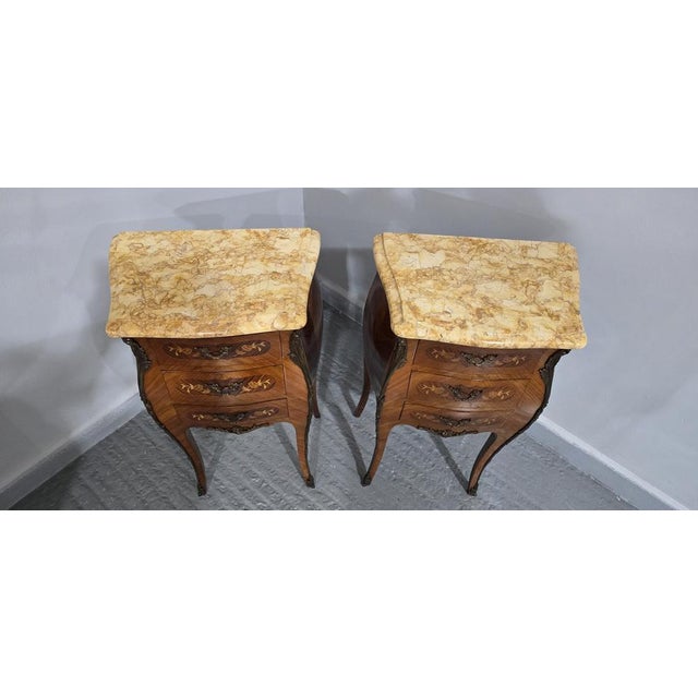 A superb pair of French bombe shaped marquetry inlaid bedside lamp tables, ormolu mounts, excellent quality marble tops....
