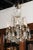An Italian crystal and bronze six-light chandelier from the mid-19th century, with central obelisk, pendeloques and...