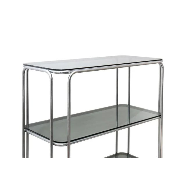 The minimalist "isocele" is an original design library created by Max Sauze in France in the seventies. Chromed metal and...