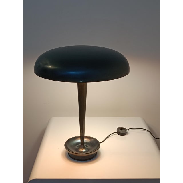 Beautiful designer desk lamp by Metalarte. Spain, 1960s. Gray lacquered metal frame. Curved and very stable base. It...