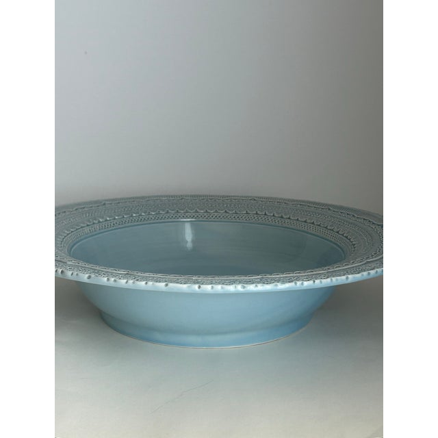 Arte Italica Merletto collection. Handcrafted in Italy and oven, dishwasher, and microwave safe. Lace placed on the top...