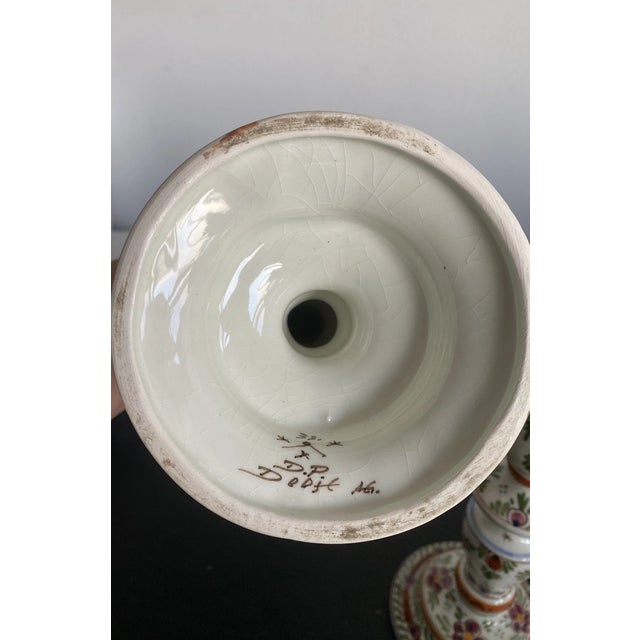 Add a touch of classic European charm to your home with this beautiful pair of vintage Delft candlestick holders....