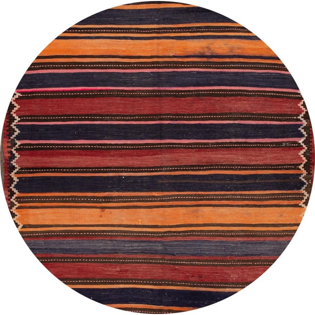 A beautiful hand-woven vintage Kilim runner with a multi-color field in an all-over stripe design. This rug measures: 5...