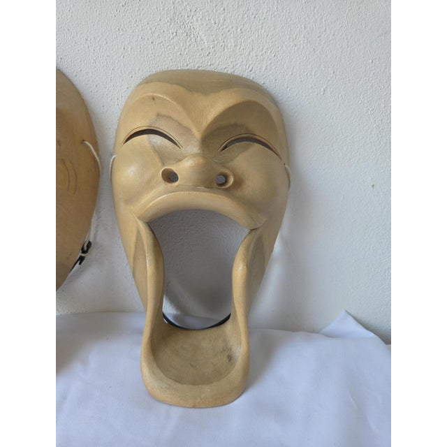 Vintage hand carved Indonesian theatrical mask, inspired by traditional Topeng dance theater. This striking elongated mask...