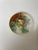 The product is a set of two French majolica Delonge trompe l'oeil circular pear dishes, one small and one larger. The...