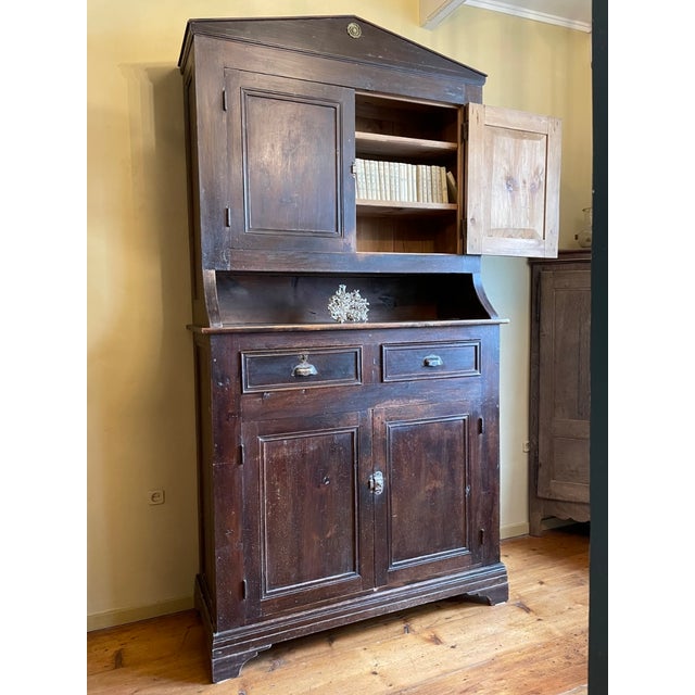 A beautiful atmospheric antique farm cabinet from Provence with a great beautiful robust appearance. It has quite thick...