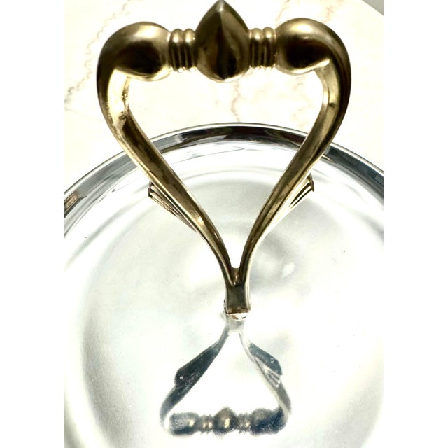 Add a touch of vintage elegance to your entertaining with this beautiful 2-tiered serving stand. Featuring polished...