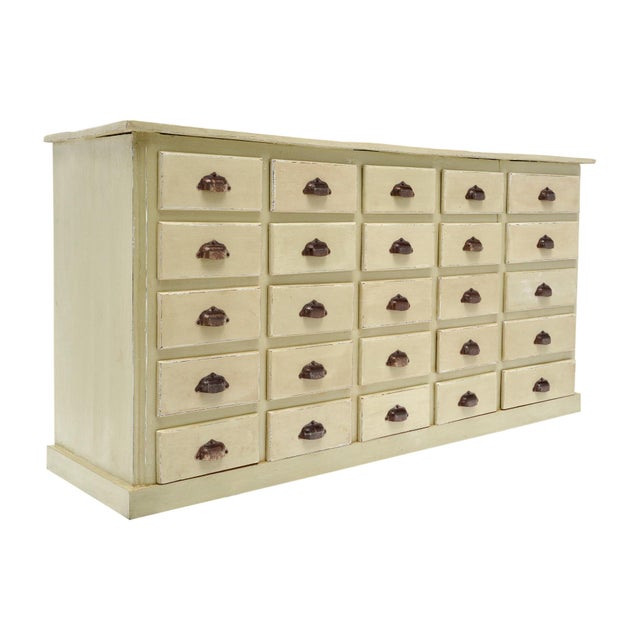 Unique and authentic antique Haberdashery cabinet from a late 19th century "Mercerie"in Lyon, France. This piece has an...