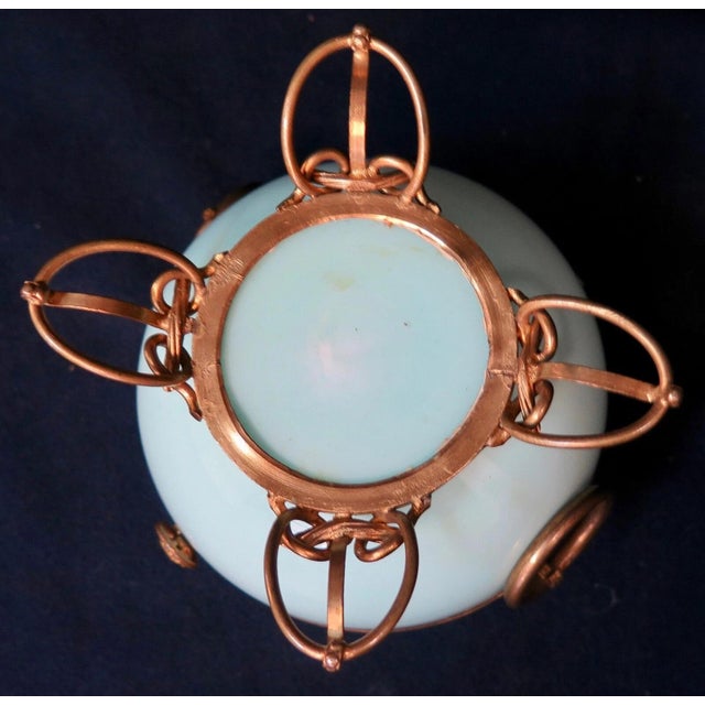 This vintage Victorian late 19th century glass trinket box originated from the United Kingdom. It has a "squatty" round...