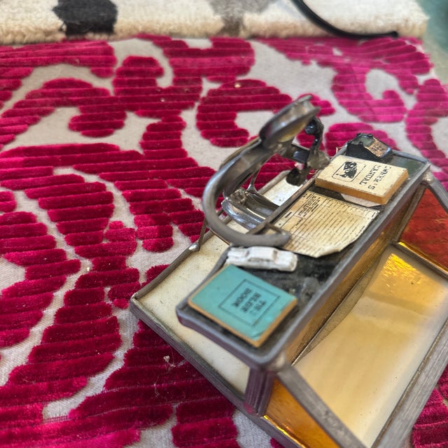 Up for consideration is a beautiful vintage amber glass and metal figure business card holder. This would look lovely in...