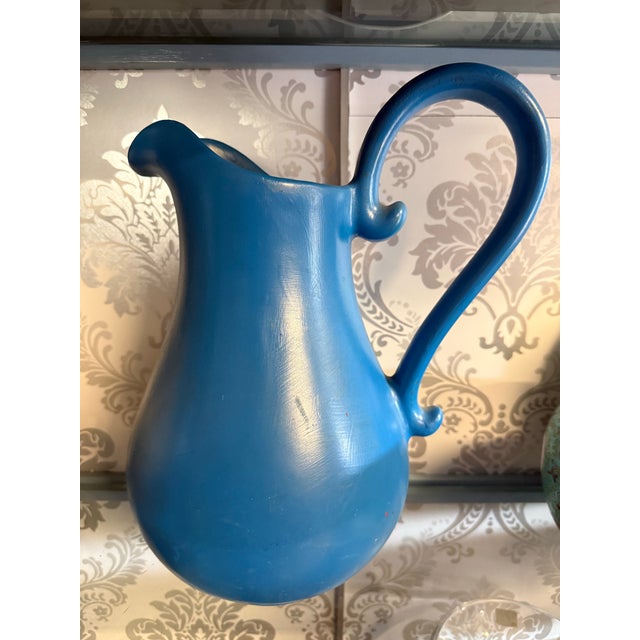 Add a vibrant splash of Mediterranean charm to your space with this striking vintage Portuguese ceramic ewer. Crafted from...