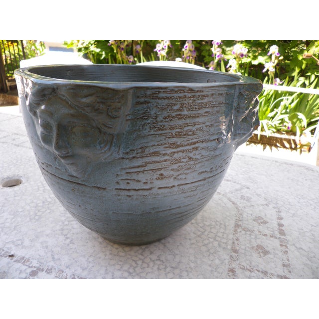 Large flower pot, planter, or cachepot from the early 1980s, made of glazed terracotta in a blue color with small light...