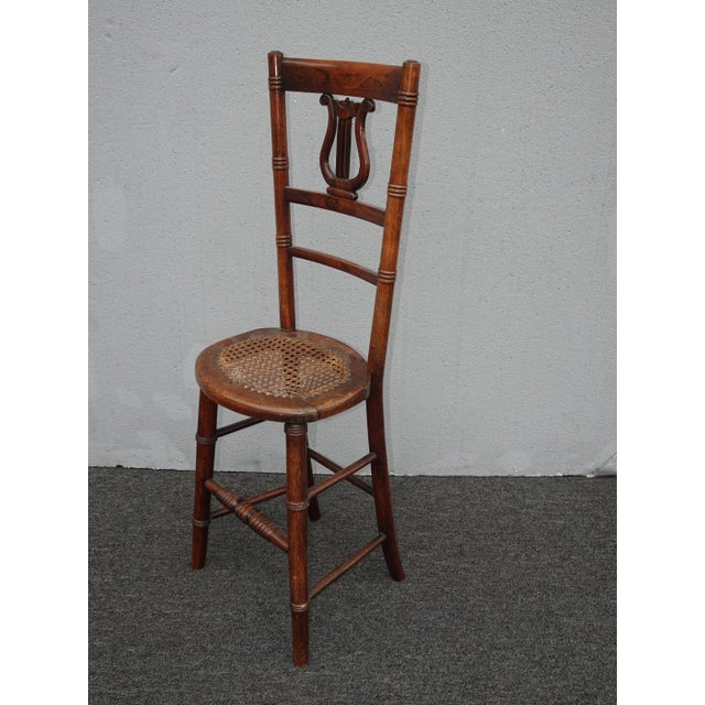 Unique Chair in Fair Vintage Condition. It is a Solid Framed Chair with a Unique Style. Built like a Barstool with the...