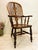 This quality Victorian Elm Antique Windsor Chair dates from ca. 1850 and has a high back with central fretted decorative...