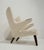 The Hans J. Wegner 1914-2007 "Papa Bear" Chair, model AP19, produced for A.P Mobler and designed in 1951, epitomizes...
