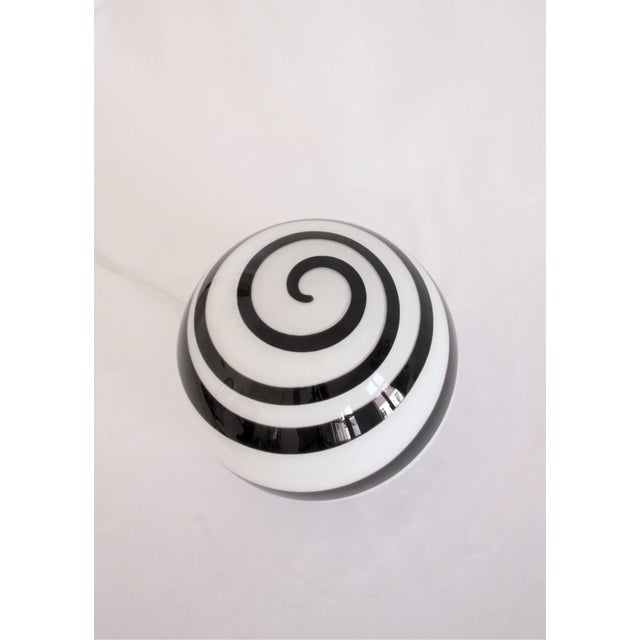 DESCRIPTION Large glass lamp with a swirl design from the German brand "Wofi Leuchten". The lamp is made of glass and...