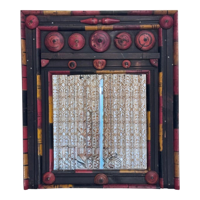 A mix of bohemian, tribal, folk art aesthetic encompasses this vintage wall mirror. Consisting of architectural fragments...