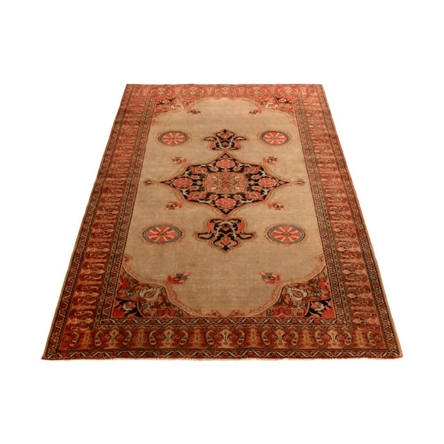 Hand knotted in wool originating between 1890-1900, this antique Doroksh rug hails from the Doroksh province of Persia,...