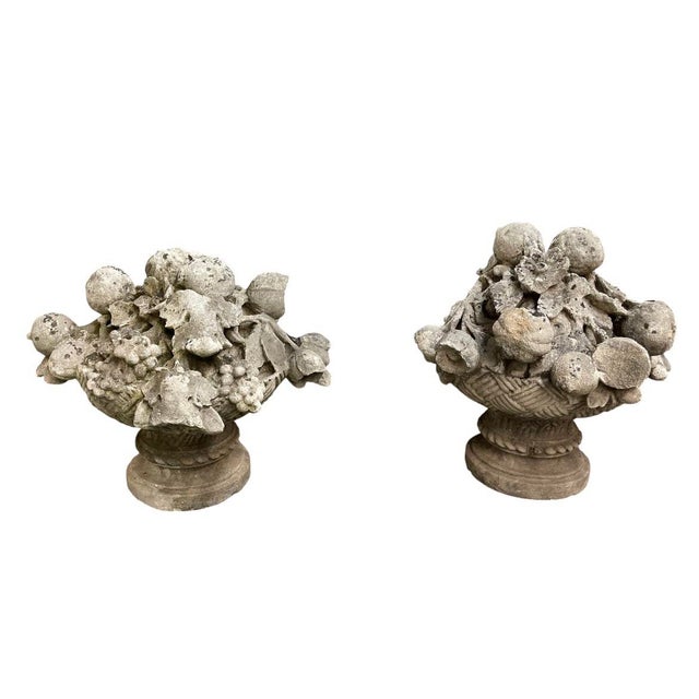 This striking pair of vintage cast stone garden finials features a traditional fruit basket motifs. Each finial is...