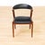 Designed by Johannes Andersen, this Danish teak armchair is a beautiful example of Scandinavian mid-century design....