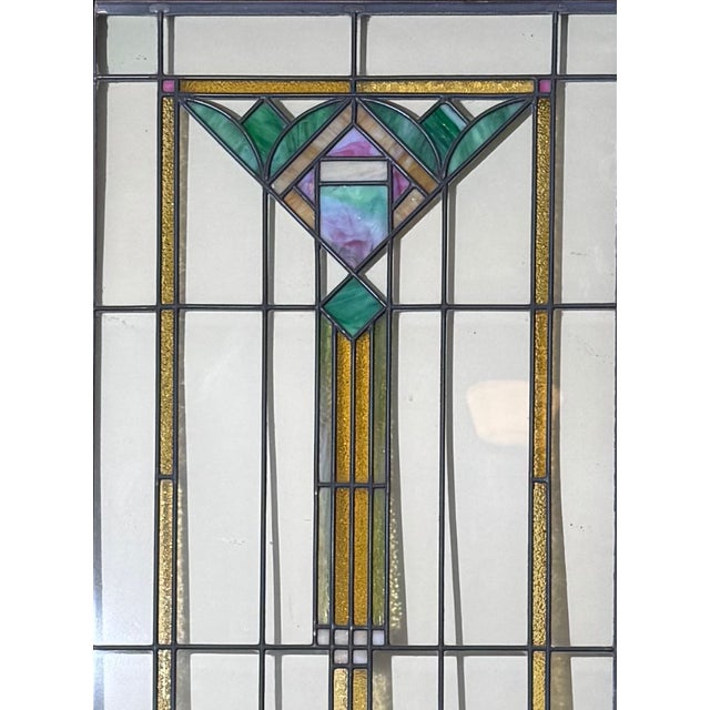 Restored leaded and stained glass entry/exterior door. Made of Mahogany. Dimensions: 29 1/2 W x 79 1/2 H