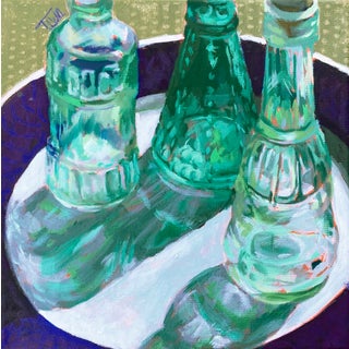Captivate by Tracy Wall | Oil on canvas Still life of three green glass bottles on a plate For Sale