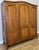 This elegant Vintage French Louis wardrobe offers timeless charm with beautifully shaped panel doors, a graceful curved...