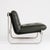 Italian-made armchair from the 1970s. The original dark green faux leather is in very good condition and shows no signs of...