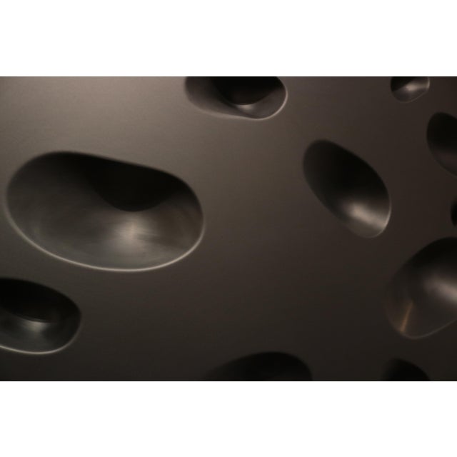 Willi Siber wall object . Matte black finish with concave shapes. Signed on the back. Black varnish, hand sanded, on MDF....