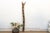 Escarpment Totem is a commanding vertical artifact, standing at an impressive 81 inches. Hand-carved from a single,...
