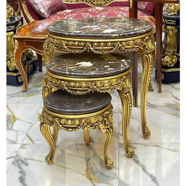 This elegant set of three French style nesting tables combines timeless design with practical functionality. Each table...