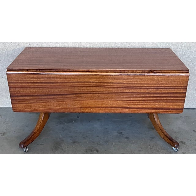 Mid-Century Modern convertible liftable coffee dining table with folding leafs. You can use the table like a coffee table...