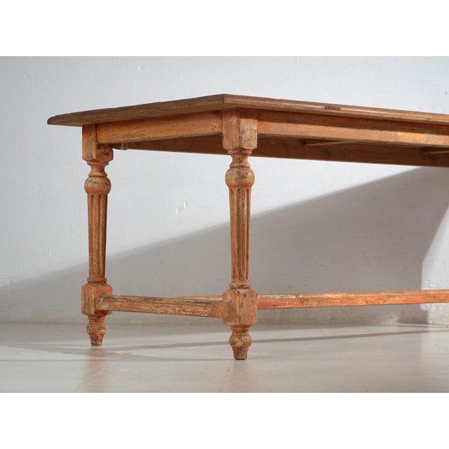 Large-scale dining table crafted from reclaimed oak, recently made circa 2025 using antique wood, reinterpreting the...
