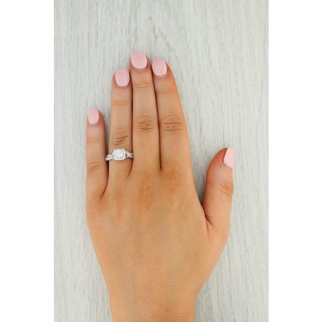 Gemstone Information: - Natural Diamond Center - Carats - 0.46ct (4.9 mm) Cut - Round Brilliant Color - J Clarity - VS2 -...