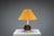 This distinctive Danish vintage table lamp carries a quiet sculptural presence, blending craftsmanship with an almost...