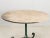 A mid-20th-century French garden or pub table adorned with a luxurious white marble top exudes a timeless charm that...