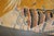 A rare wide large runner size Tibetan Dragon Pillar Rug . Background color is yellow