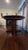 Shaker style solid cherry wood pedestal dining table with 16" expansion leaf. Made by Ethan Allen, "American Impressions"...