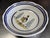 Large earthenware centerpiece platter with a painted decoration of a drummer in a landscape. Late 18th century. Diameter:...