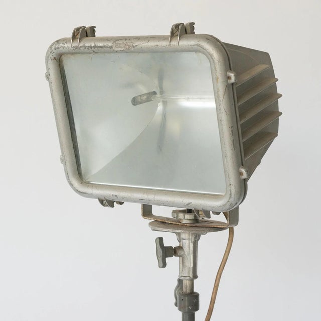 Industrial Tripod Floor Lamp, 1950s, in Worn conditions. Designed 1950 to 1959 European Plug (up to 250V).The wiring of...