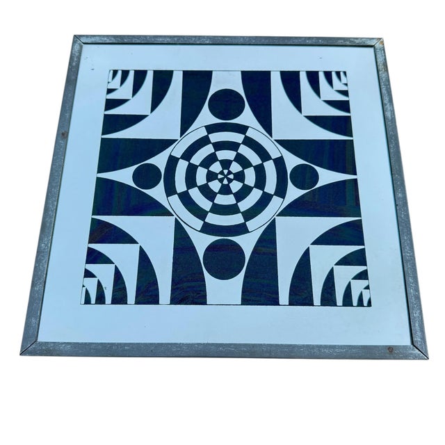 Set of four op art midcentury modern wall mirrors with metal frame. One mirror shows a small scratch in the design....