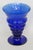 This stunning Ribbed Goblet / Vase is made of glass. This lovely footed vessel features a gorgeous cobalt blue color...