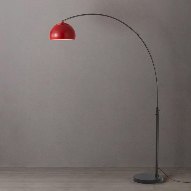 The Half Dome Arc Lamp, designed by Peter Morelli in 1960, is a modern masterpiece that combines a sweeping arc silhouette...