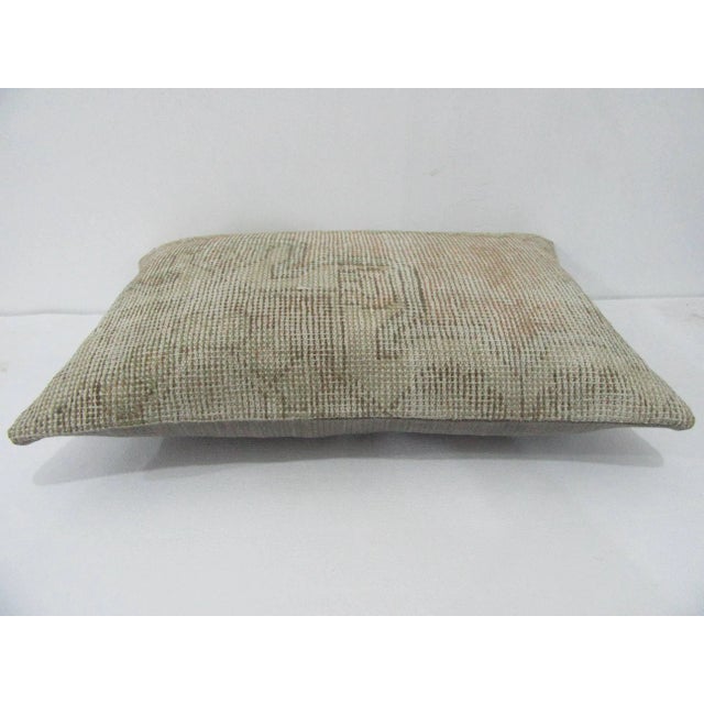 Decorative pillow cover made from a vintage Turkish handknotted rug. Backed with good quality cotton fabric. Pillow...