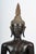 A bronze buddha sculpture, brown patina, from thai-lao, principality of chieng kham, circa 17th century. H: 52cm. W: 35cm,...