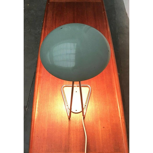 Very rare 6763 table lamp from Kaiser Leuchten. The special feature of this table lamp is the design of the base, which...