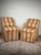 This inviting pair of upholstered slipper chairs combines a classic low, armless profile with generous cushioning and a...