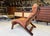 In good used condition with age related marks present. Stable and sound in construction! A rare tan leather lounge chair...