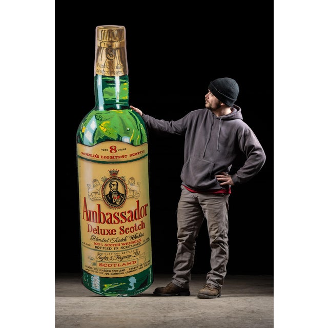 c. 1940s/1950s; Taylor & Ferguson Ltd. - Glasgow, Scotland Vintage large figural scotch bottle sign. This piece depicts an...